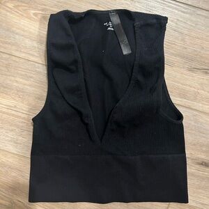 Urban outfitters black ribbed tank top with a deep v neckline women's medium